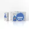 IGET B5000 packaging: white and blue boxes with strawberry-kiwi ice flavor artwork on a white surface.
