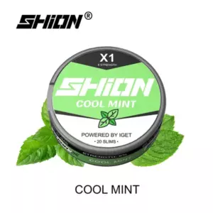 Shion Cool Mint nicotine pouches tin with a bright green label, surrounded by fresh mint leaves.
