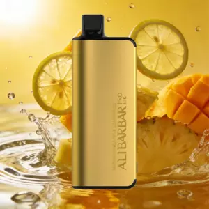 Gold vape pod with flavor Mango Pineapple Lemonade, set against a tropical fruit background.