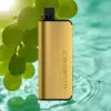 Alibarbar Pro 10k Blackurrant - Gold Rectangular Vape Pod with Black Top Against a Backdrop of Green Grapes and Turquoise Water Ripples. - Iget Vapes Shop Oz